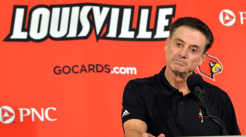 Louisville head coach Rick Pitino, whose program is already on NCAA probation, is now caught up in an FBI investigation in which a recruit reportedly was paid $100,000. (AP photo)