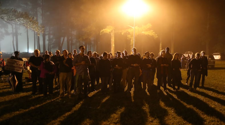 September 29, 2015 Jackson: Protesters sing songs into the night outside of Georgia Diagnostic Prison in Jackson on Tuesday evening September 29, 2015 before the scheduled execution of Kelly Gissendaner. Ben Gray / bgray@ajc.com