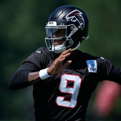 Atlanta Falcons quarterback Michael Penix Jr. runs drills during an NFL training camp practice Monday, Aug. 24, 2026, in Flowery Branch. (Brynn Anderson/AP)