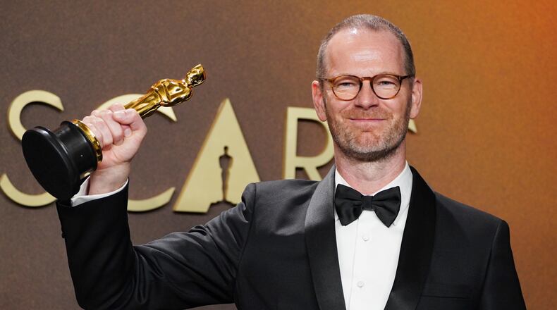 Joachim Trier, winner of the award for international feature film for "Sentimental Value," poses in the press room at the Oscars on Sunday, March 15, 2026, at the Dolby Theatre in Los Angeles. (Photo by Jordan Strauss/Invision/AP)