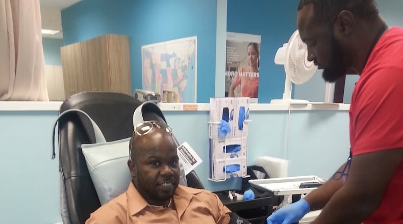 Josh Reid, an employee of Red Cross since 2007, donates blood regularly as his way of thanking the donors who saved his life after a catastrophic car accident in 1999. (Courtesy)