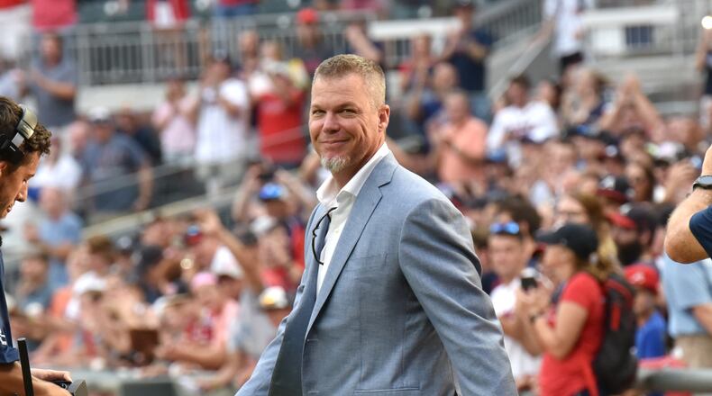 Chipper Jones walks onto the field at SunTrust Park for a pregame ceremony Friday night.