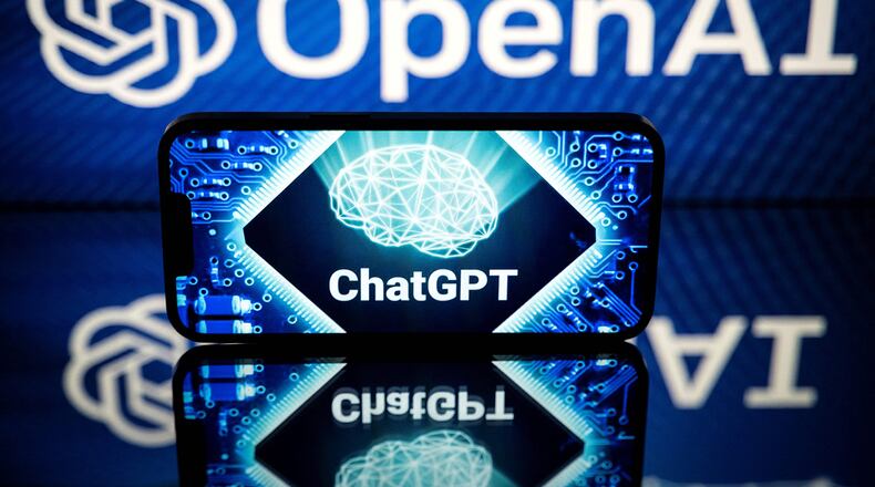 This picture taken on Jan. 23, 2023, in Toulouse, southwestern France, shows screens displaying the logos of OpenAI and ChatGPT. - ChatGPT is a conversational artificial intelligence software application developed by OpenAI. (Lionel Bonaventure/AFP via Getty Images/TNS)