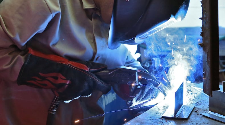 Nov. 13, 2015 - Jesus Vazquez works on a MIG welding assignment in welding lab. The Lanier Charter Career Academy student was taking a welding class at nearby Lanier Technical College. BOB ANDRES / BANDRES@AJC.COM