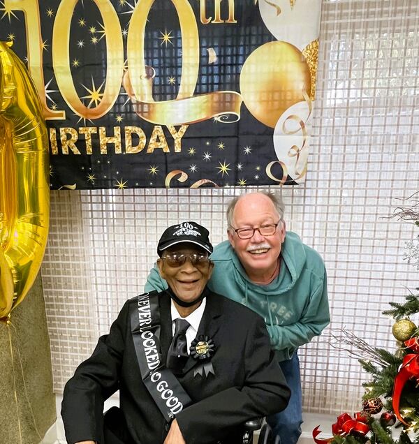 The author, Ben Goggins, takes his turn posing with Rev. Brown.