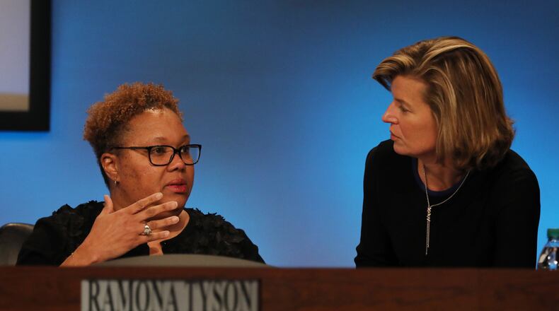 Interim Superintended Ramona Tyson, talks with DeKalb County Board of Education member Allyson Gevertz before the board's meeting on Feb. 10, 2020, at district headquarters. (AJC FILE PHOTO)