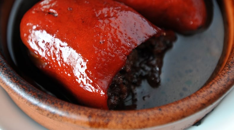 Piquillo peppers stuffed with braised beef.