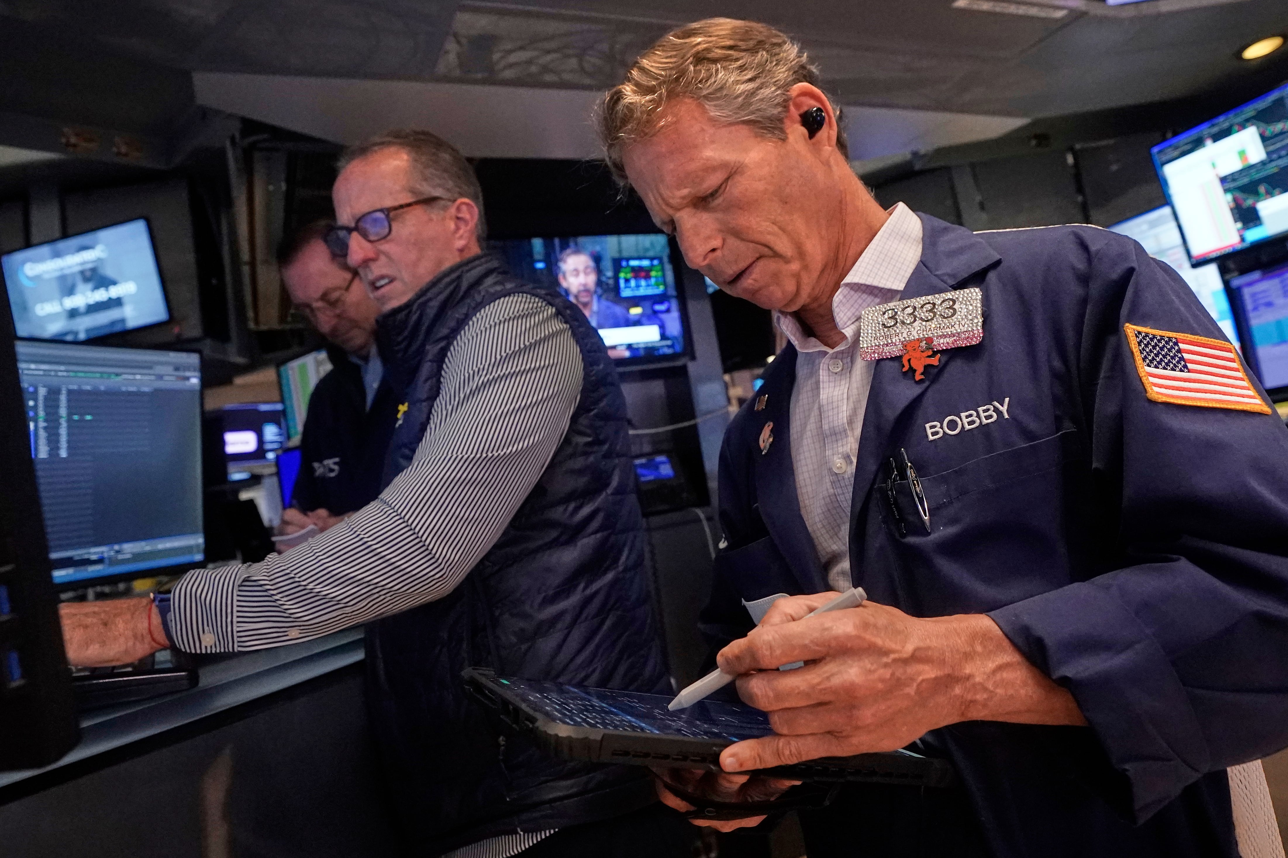Wall Street ticks higher before the bell as markets anxiously await the Fed's interest rate decision