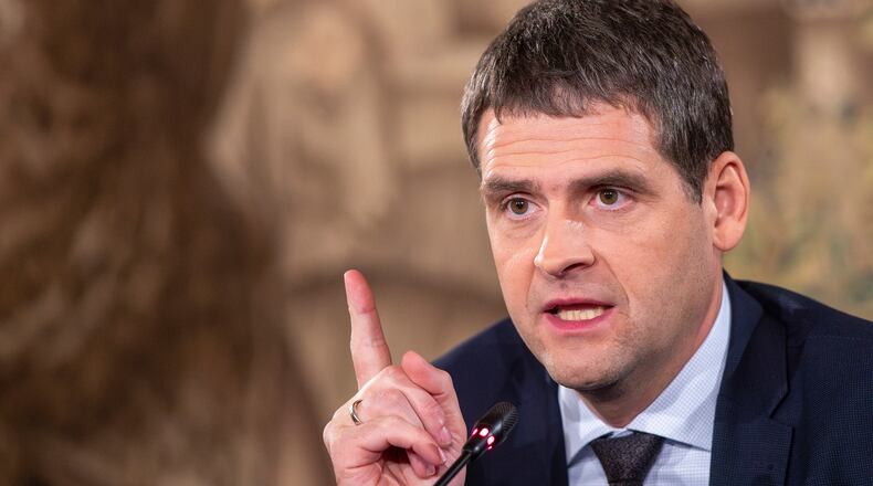 FILE -Leader of the Nemuno Aušra (Nemunas Dawn) party Remigijus Žemaitaitis, speaks at a press conference after a first round of Lithuania's parliamentary election, in Vilnius, Lithuania, Oct. 14, 2024. (AP Photo/Mindaugas Kulbis, File)