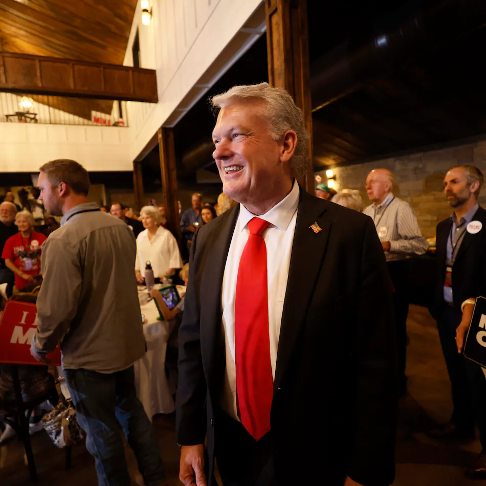 U.S. Rep. Mike Collins prepares to give a speech during his runoff election watch party at Seven Oaks Manor in Jackson last Tuesday. (Miguel Martinez/AJC)