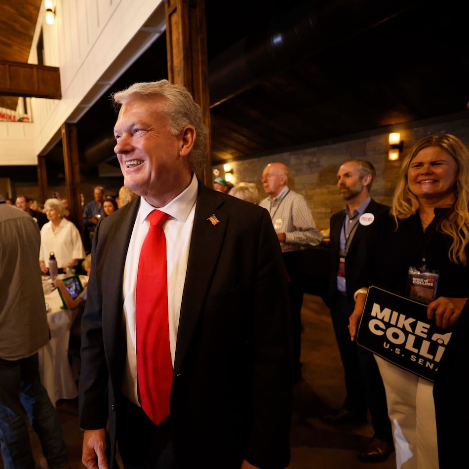 U.S. Rep. Mike Collins prepares to give a speech during his runoff election watch party at Seven Oaks Manor in Jackson last Tuesday. (Miguel Martinez/AJC)