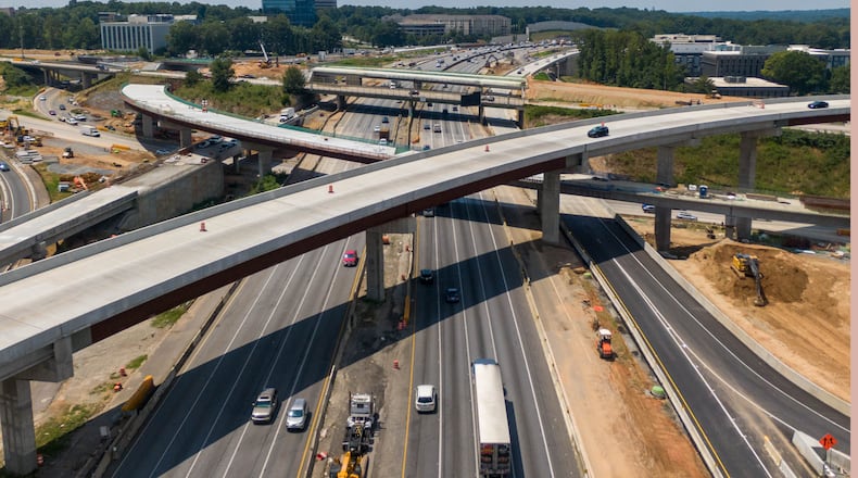 Aerial photo shows construction site of I-285 interchange at Ga. 400 in Sandy Springs last August. Work on the project is expected to be completed later this year (Hyosub Shin / Hyosub.Shin@ajc.com)