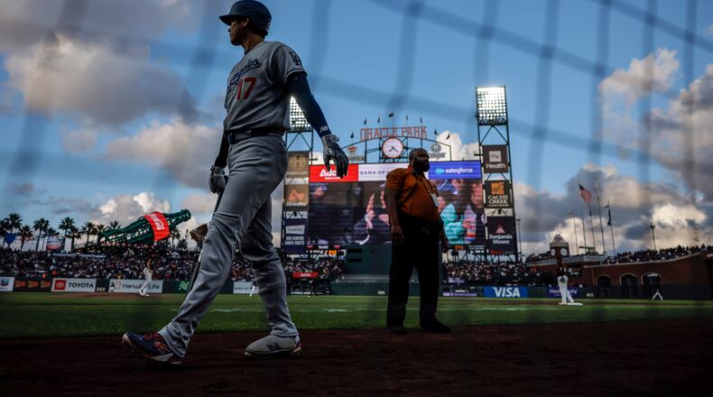 Shohei Ohtani (17) walks to the on deck circle in the third inning as the San Francisco Giants played the Los Angeles Dodgers in San Francisco, on Tuesday, April 21, 2026. (Carlos Avila Gonzalez/San Francisco Chronicle via AP)
