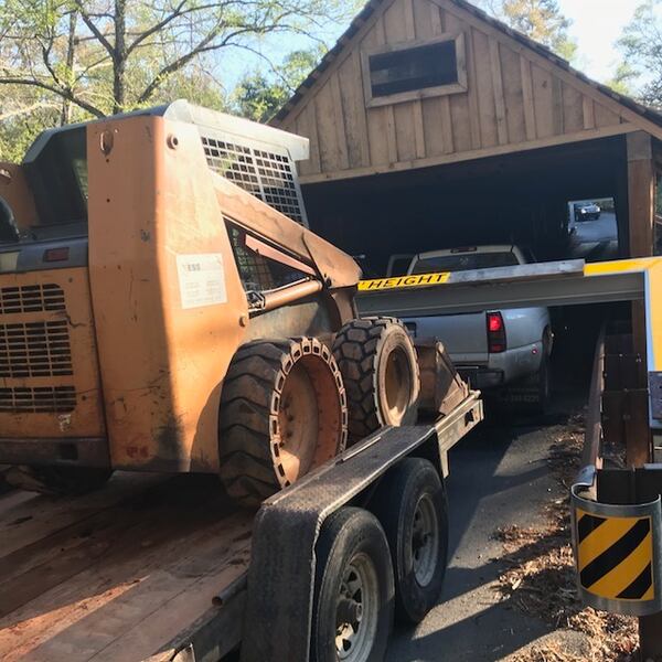 This is from April 11, 2018, when Alfredo Tello tried to drive the construction equipment he was hauling through the Concord Road Covered Bridge. It didn't work. (Photo courtesy of Cobb County Government)