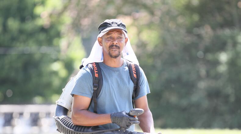 Bobby Wood works on the North Fulton Golf Course at Chastain Park Thursday.