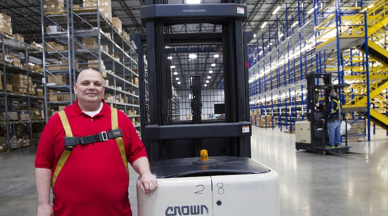 Sam Smith, technician and forklift expert, poses in the McDonough warehouse of Distribution Cooperative Inc. Demand for forklift drivers has grown along with the spread of warehouses through the south side of metro Atlanta, but it takes time and effort to learn. (REANN HUBER/REANN.HUBER@AJC.COM)