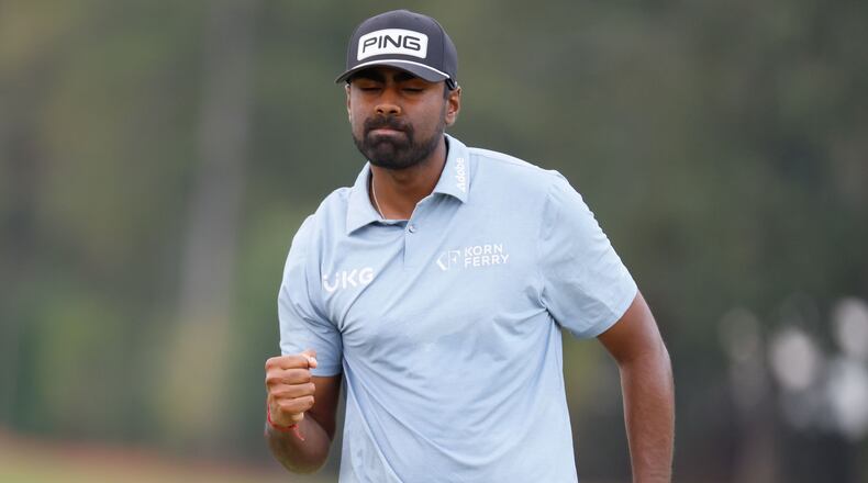 Sahith Theegala reacts after his putt on the seventh green during the final round of the Tour Championship at East Lake Golf Club, Sunday, Sept. 1, 2024, in Atlanta. 
(Miguel Martinez / AJC)