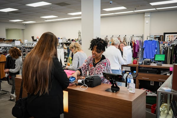 A shopper checks out at MUST Marketplace in East Cobb. 