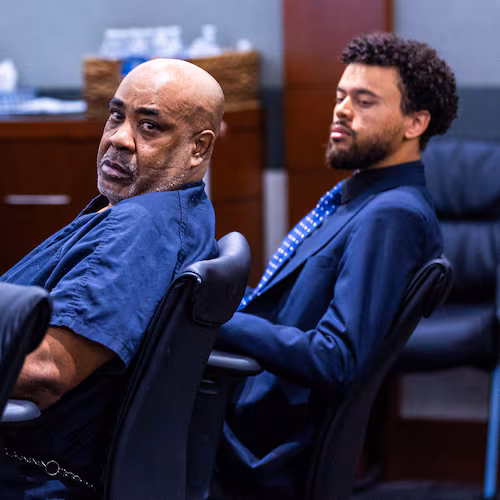 FILE - Duane Davis, left, looks back during a hearing on claims of juror misconduct in his jailhouse battery case at the Regional Justice Center, July 2, 2025, in Las Vegas. (L.E. Baskow/Las Vegas Review-Journal via AP, Pool, File)