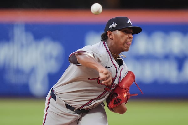 Braves pitcher Didier Fuentes gives it twirl against the Mets.