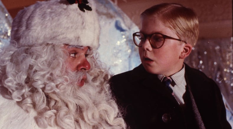Ralphie (Peter Billingsley) visits a department store Santa (Jeff Gillen) as part of his campaign to find a BB gun under his tree in the classic holiday film “A Christmas Story.” Contributed by MGM