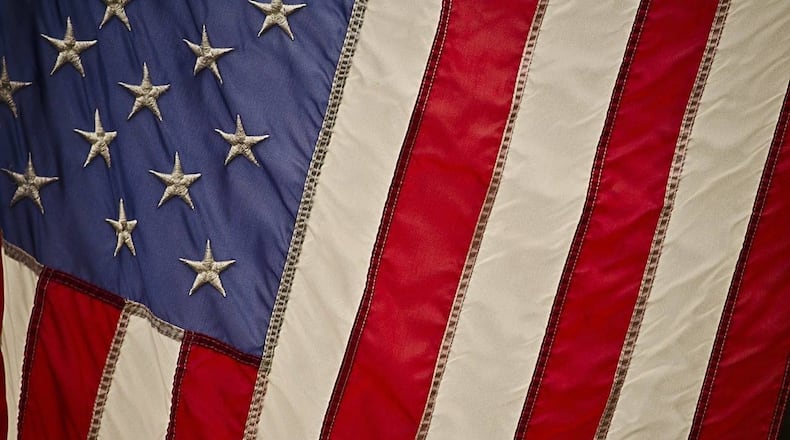 A Colorado man said he is defying a rule in his lease agreement to fly an American flag off the balcony of his apartment.