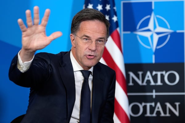 Secretary General Mark Rutte gestures during a meeting with President Donald Trump at the NATO summit in The Hague, Netherlands, Wednesday, June 25, 2025. (AP Photo/Alex Brandon)