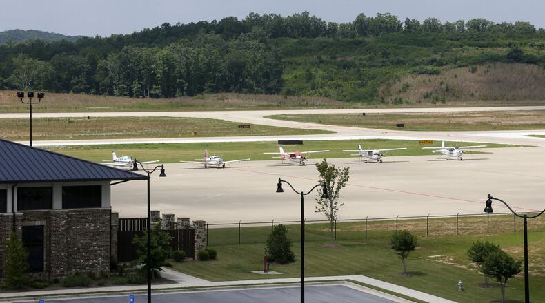 Planes are parked on the tarmac at Paulding’s general aviation airport. BOB ANDRES / BANDRES@AJC.COM