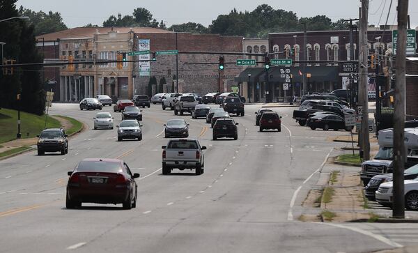 Motorist make thier way through downtown Fairburn on Monday, August 12, 2019, in Fairburn. CURTIS COMPTON/CCOMPTON@AJC.COM