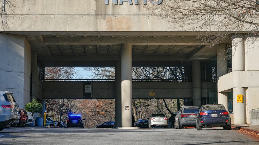 Police respond to North Atlanta High School after a student was injured in an altercation with another student Friday. (Ben Hendren for the AJC)
