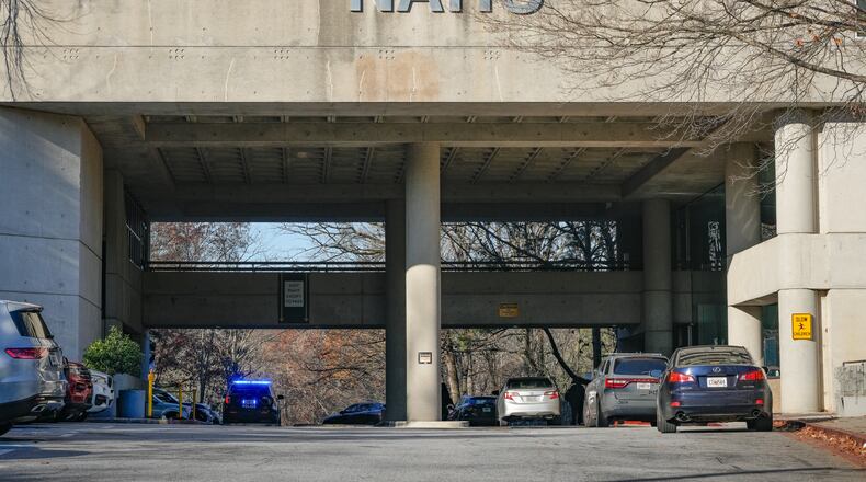 Police respond to North Atlanta High School after a student was injured in an altercation with another student Friday, Dec, 12, 2025. (Ben Hendren for the AJC)