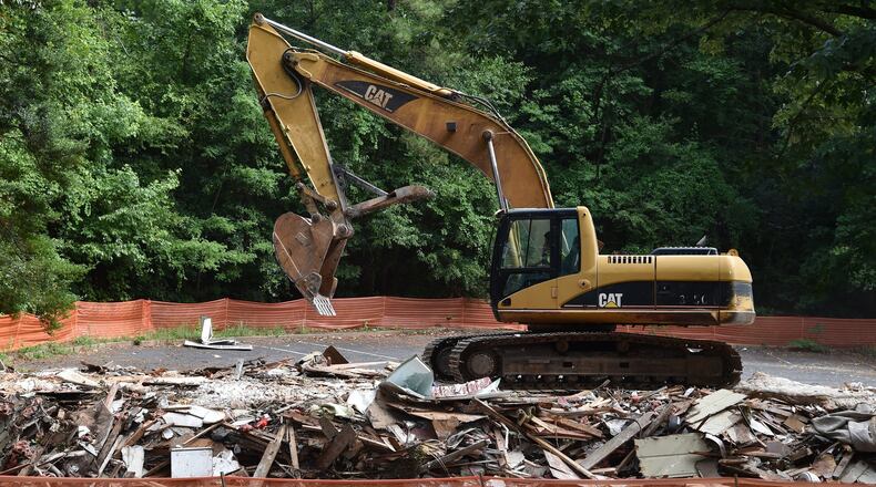 The South Cobb Redevelopment Authority tore down the The Magnolia Crossing Apartment Complex on Six Flags Drive in preparation for sale. (BRANT SANDERLIN/BSANDERLIN@AJC.COM)
