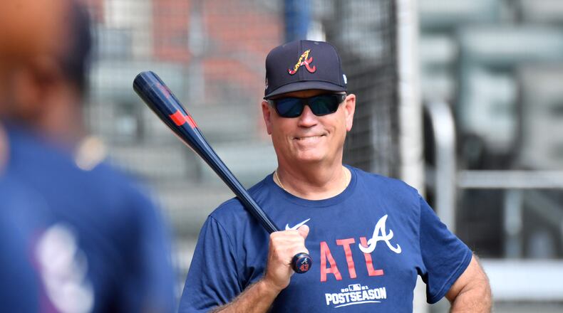 Atlanta Braves Manager Brian Snitker looks over his team during a workout Oct. 14 at Truist Park before the start of the 2021 NLCS. Registration concludes Nov. 3 for the Nov. 8 Marquee Monday luncheon by the Cobb Chamber who will welcome Snitker and announce Teachers of the Year for the Cobb County School District and Marietta City Schools. (Hyosub Shin / Hyosub.Shin@ajc.com)