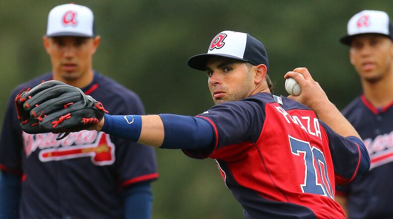 Jose Peraza, shown fielding a grounder in a spring-training drill, has begun to play some center field at Triple-A Gwinnett as the Braves look to find a spot for the top prospect. (Curtis Compton / ccompton@ajc.com)