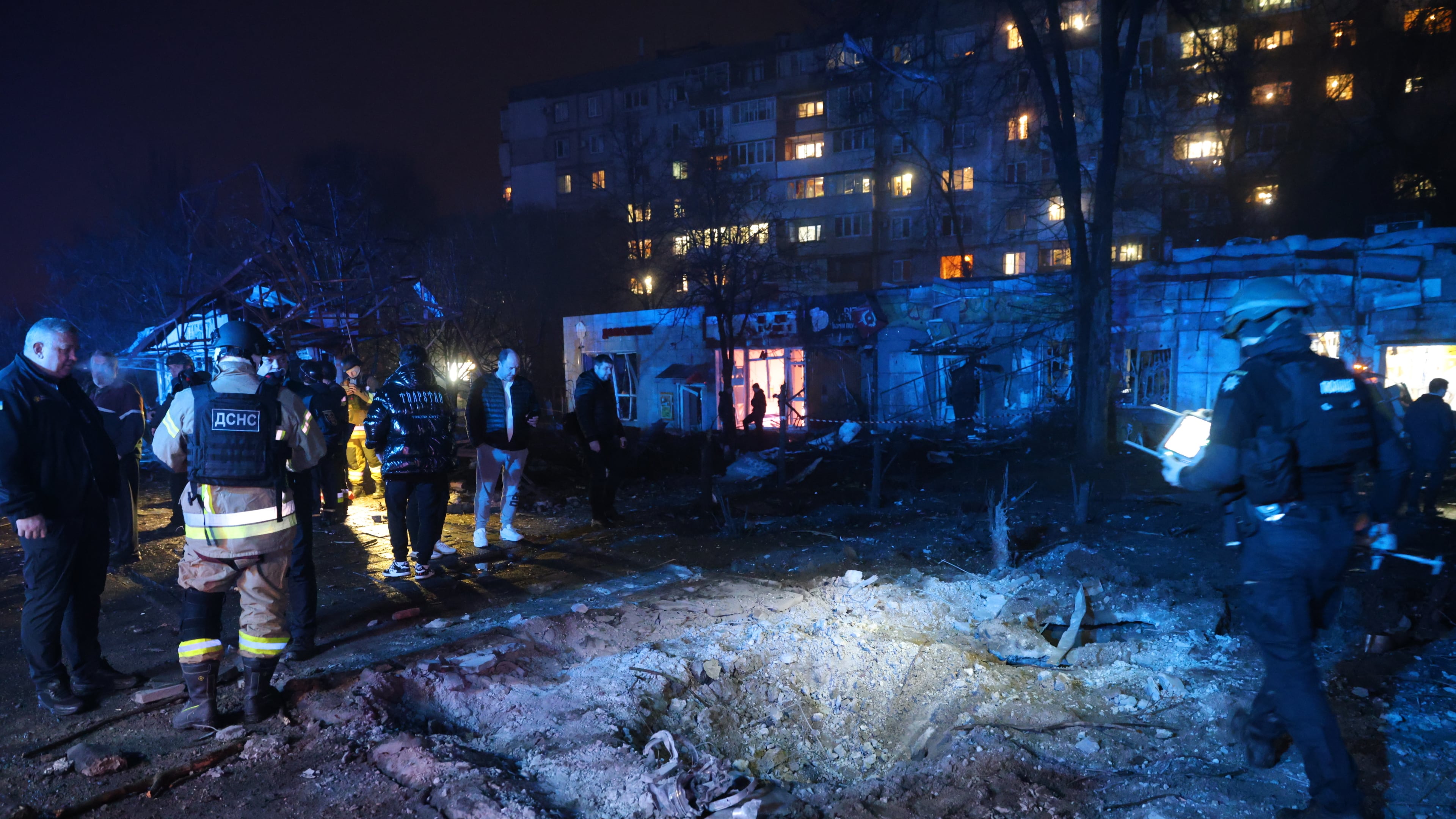 A crater is seen at a market destroyed by a Russian airstrike on Zaporizhzhia, Ukraine, Friday, Nov. 21, 2025. (AP Photo/Kateryna Klochko)