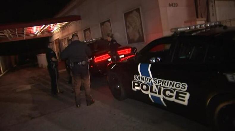 Sandy Springs police officers conduct compliance checks on local strip clubs. (Credit: Channel 2 Action News)
