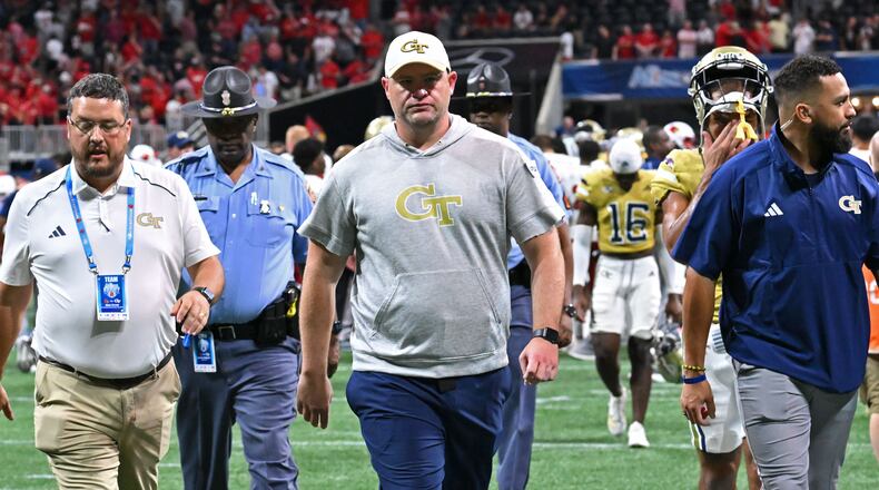 Georgia Tech's head coach Brent Key leaves the football field after Louisville defeat Georgia Tech during the inaugural Aflac Kickoff Game at Mercedes-Benz Stadium, Friday, September 1, 2023, in Atlanta. Louisville won 39-34 over Georgia Tech. (Hyosub Shin / Hyosub.Shin@ajc.com)
