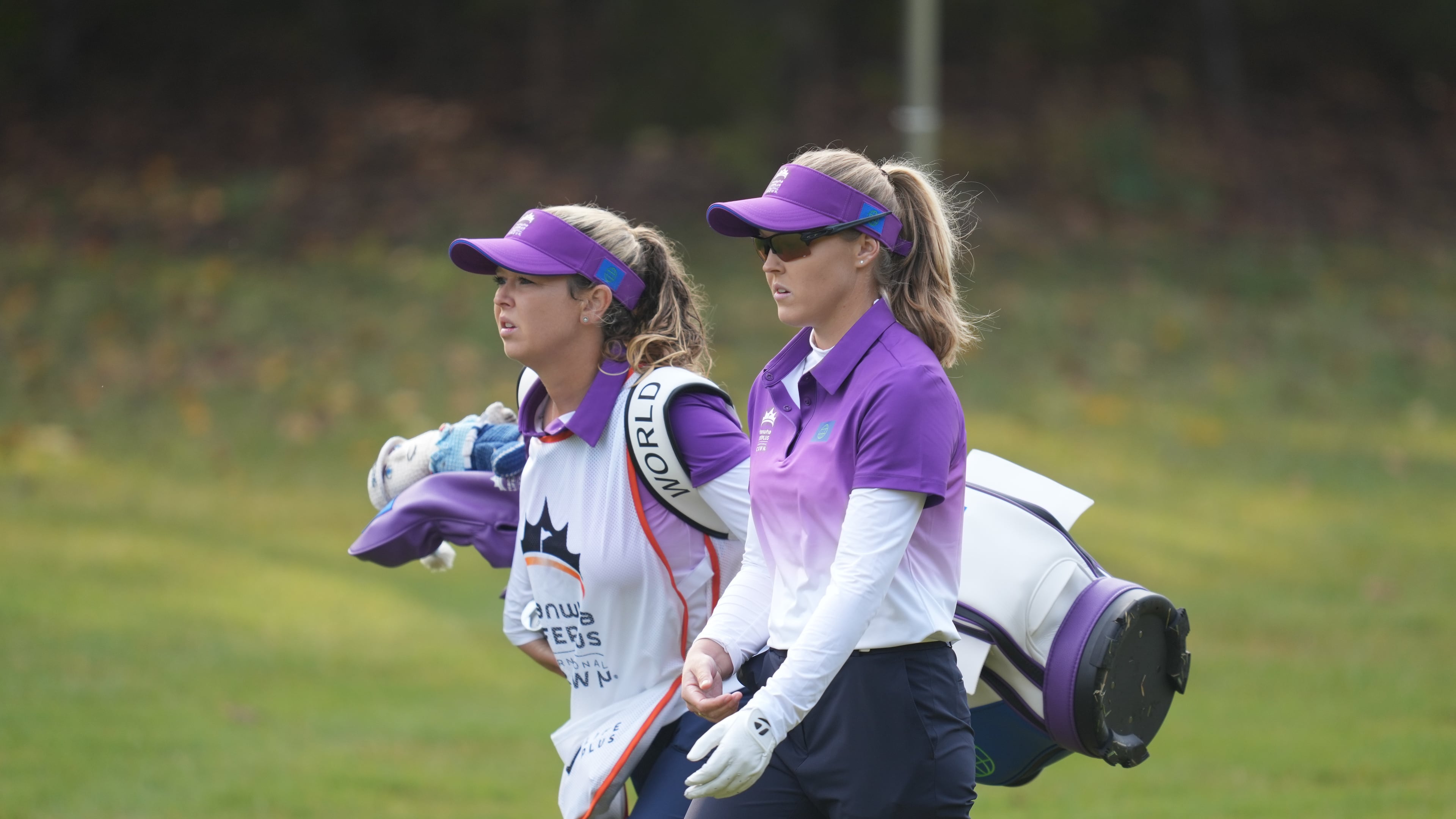 Brooke Henderson of World Team Brooke Henderson, right, of World Team walks with her caddie and sister Brittany Henderson on the first hole during the pool B match against Sweden team for the LPGA International Crown golf tournament at the New Korea Country Club in Goyang, South Korea, Saturday, Oct. 25, 2025. (AP Photo/Lee Jin-man)