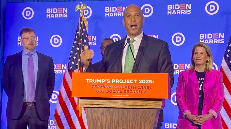 U.S. Sen. Cory Booker, D-N.J., speaks at a news conference in Milwaukee. Booker said former President Donald Trump would gut the Affordable Care Act and restrict abortion access for women if he is elected to a second term. (Shaddi Abusaid / AJC)
