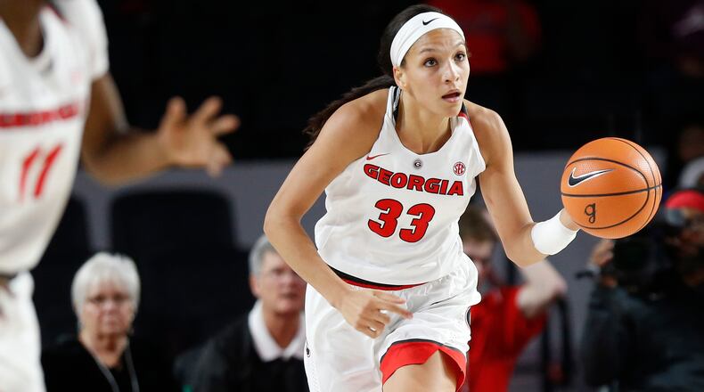 Georgia forward Mackenzie Engram (33) moves the ball down the court during an NCAA college basketball game against Georgia Tech, Sunday, Dec. 17, 2017 in Athens, Ga. (Joshua L. Jones/Athens Banner-Herald via AP)