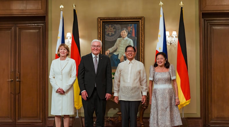 German President Frank-Walter Steinmeier, center left, with his wife Elke Budenbender, left, and Philippine President Ferdinand Marcos Jr. with his wife Liza Araneta Marcos pose for pictures in Manila, Philippines Tuesday, June 16, 2026. (Ezra Acayan/Pool Photo via AP)
