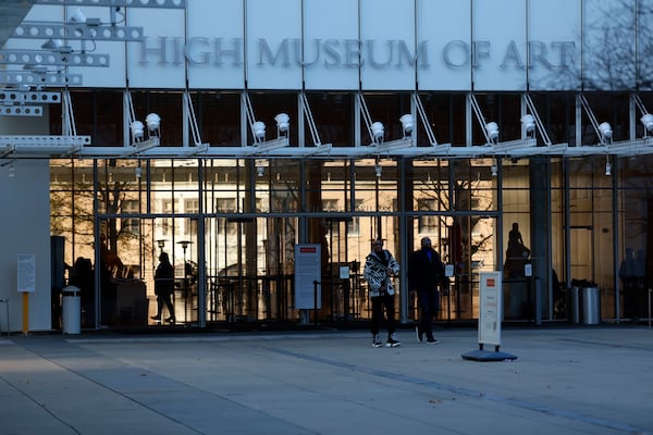 People stand near the main entrance of the High Museum of Art in Midtown. (Miguel Martinez/AJC 2025)