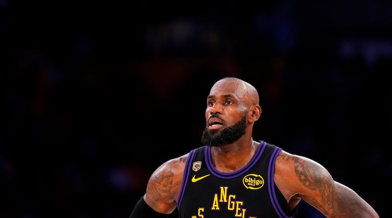 Los Angeles Lakers forward LeBron James stands on the court in the closing minutes of Game 4 in a second-round NBA basketball playoffs series against the Oklahoma City Thunder, Monday, May 11, 2026, in Los Angeles. (AP Photo/Mark J. Terrill)