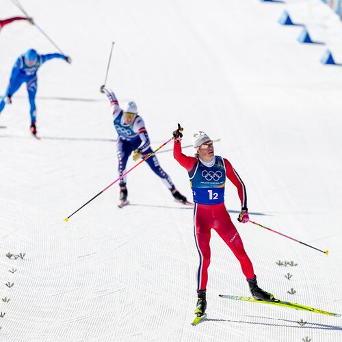 Johannes Hoesflot Klaebo, of Norway, approaches the finish line to win the gold medal in the cross-country skiing men's team sprint free at the 2026 Winter Olympics, in Tesero, Italy, Wednesday, Feb. 18, 2026. (AP Photo/Matthias Schrader)