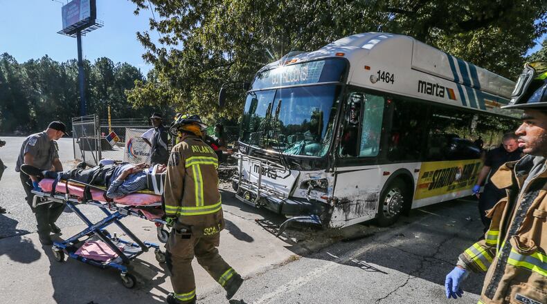 Emergency crews work at the scene of a MARTA bus crash.