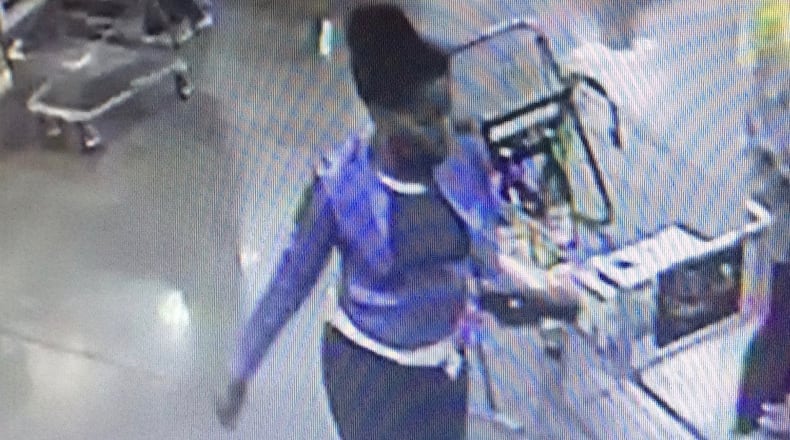 Police are asking for public help to identify a woman who allegedly purchased gift cards using a stolen credit card. Courtesy Peachtree City Police