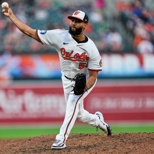 FILE - Baltimore Orioles relief pitcher Seranthony Dominguez (56) delivers during the ninth inning in the second baseball game of a doubleheader against the New York Mets, July 10, 2025, in Baltimore. (AP Photo/Stephanie Scarbrough, File)