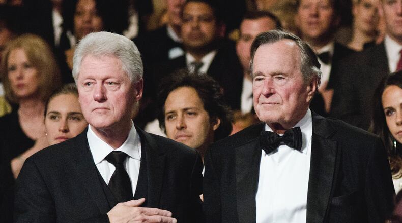 WASHINGTON, DC - MARCH 21: Bill Clinton and George H.W. Bush attend the Points of Light Institute Tribute to Former President George H.W. Bush at The John F. Kennedy Center for Performing Arts on March 21, 2011 in Washington, DC. (Photo by Kris Connor/Getty Images)