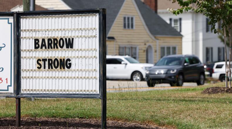 A sign reads "Barrow Strong" at Ann's Flower & Gift Shop in memory of the four victims shot and killed at Apalachee High School in September in Winder. (Jason Getz/AJC)