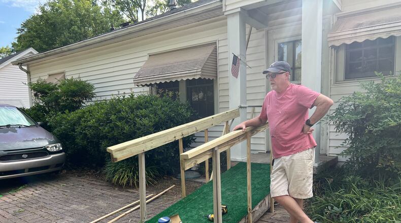 Paull Hill said he and other volunteers from First Baptist Church of Marietta were already planning to do work on Robert Morrison's Wright Street home before he was seriously injured by a hit-and-run driver while standing his front yard Saturday.